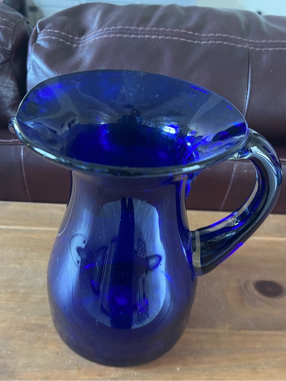 Handblown Cobalt Blue Glass pitcher. No chips or cracks. Very pretty. 8 3/4”tall
